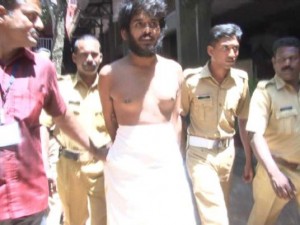 satnam_singh_mann_in_police_custody_in_amritapuri